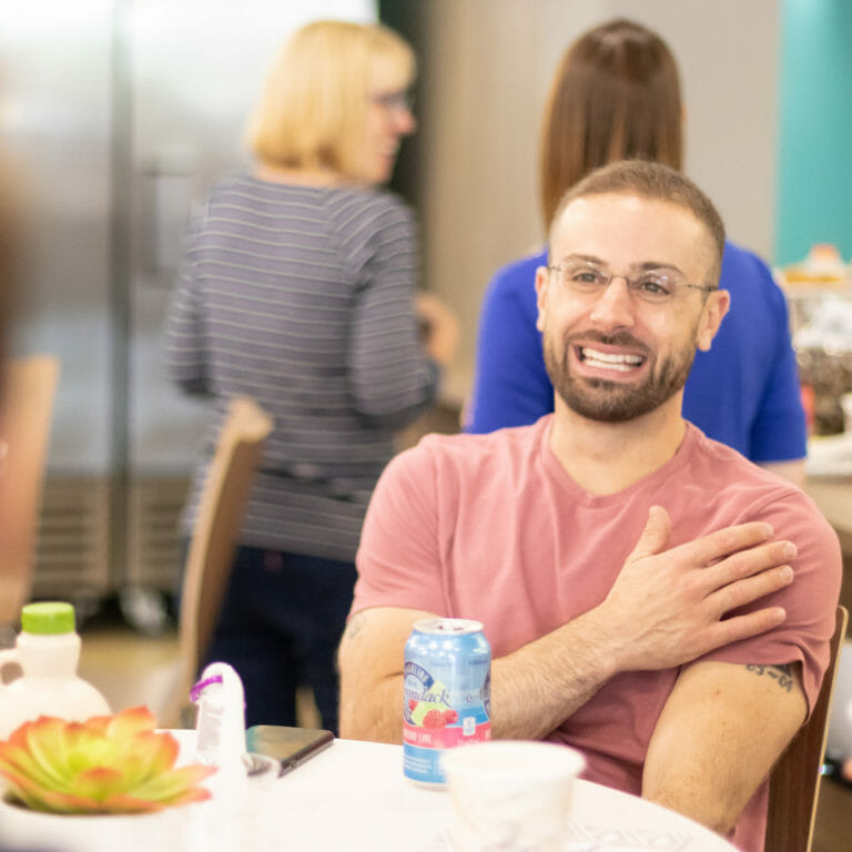 employee in kitchen at lunch