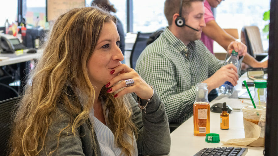 two employees with headsets