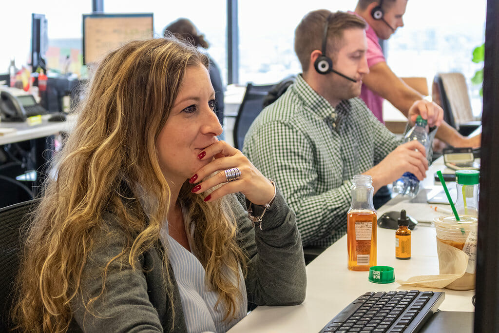 two employees with headsets