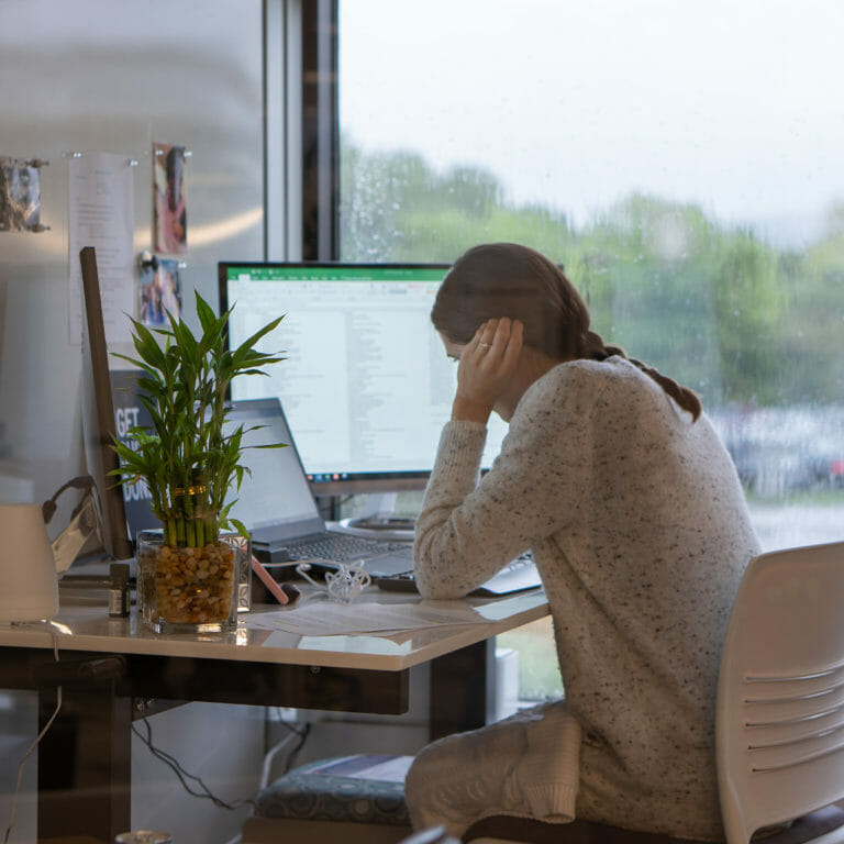 employee sitting at desk