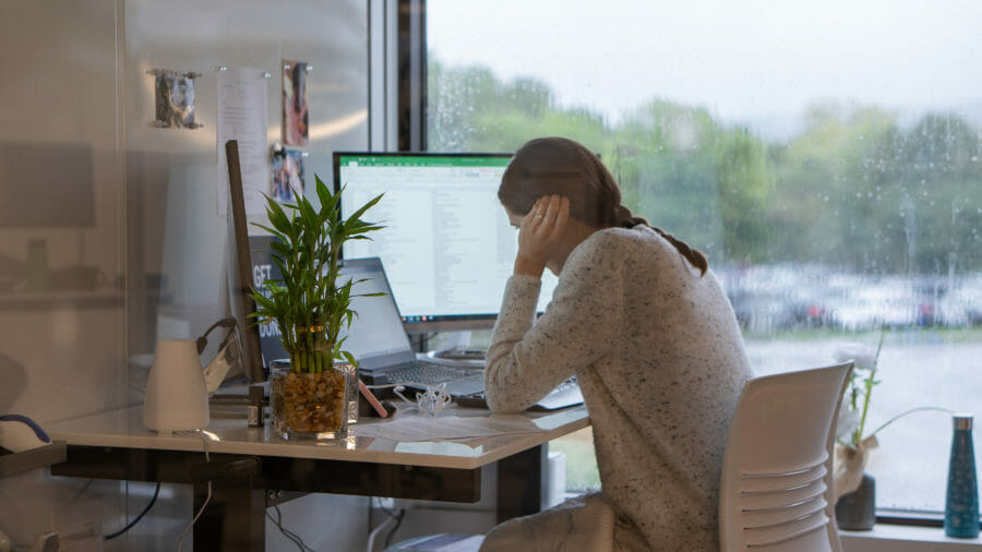 employee sitting at desk