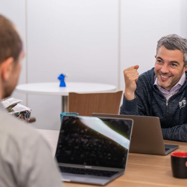 A recruiter interviews a candidate during the candidate selection process.