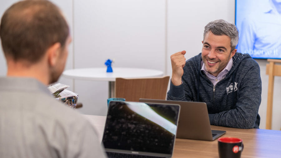 A recruiter interviews a candidate during the candidate selection process.