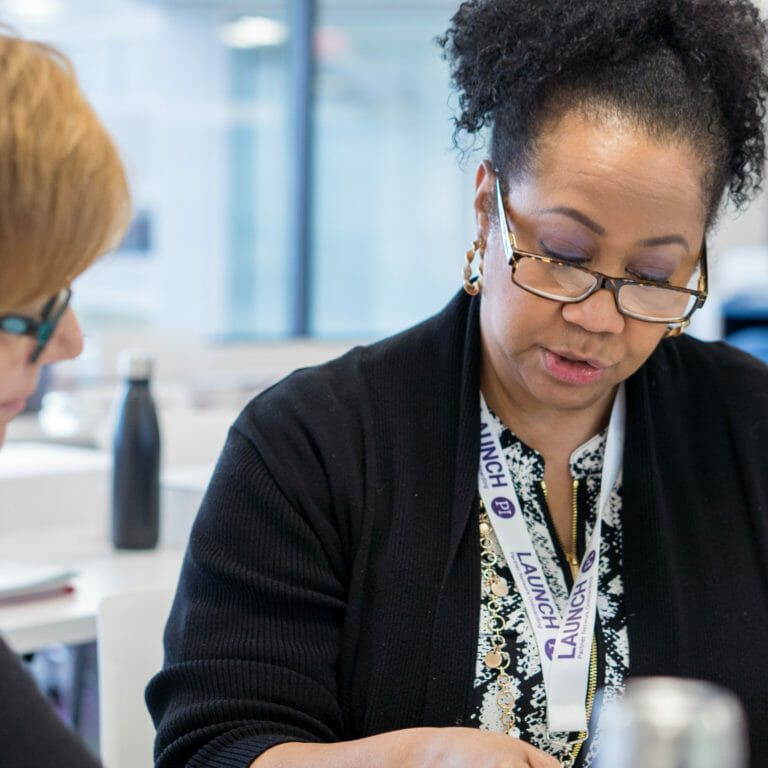 consultant walking client through process