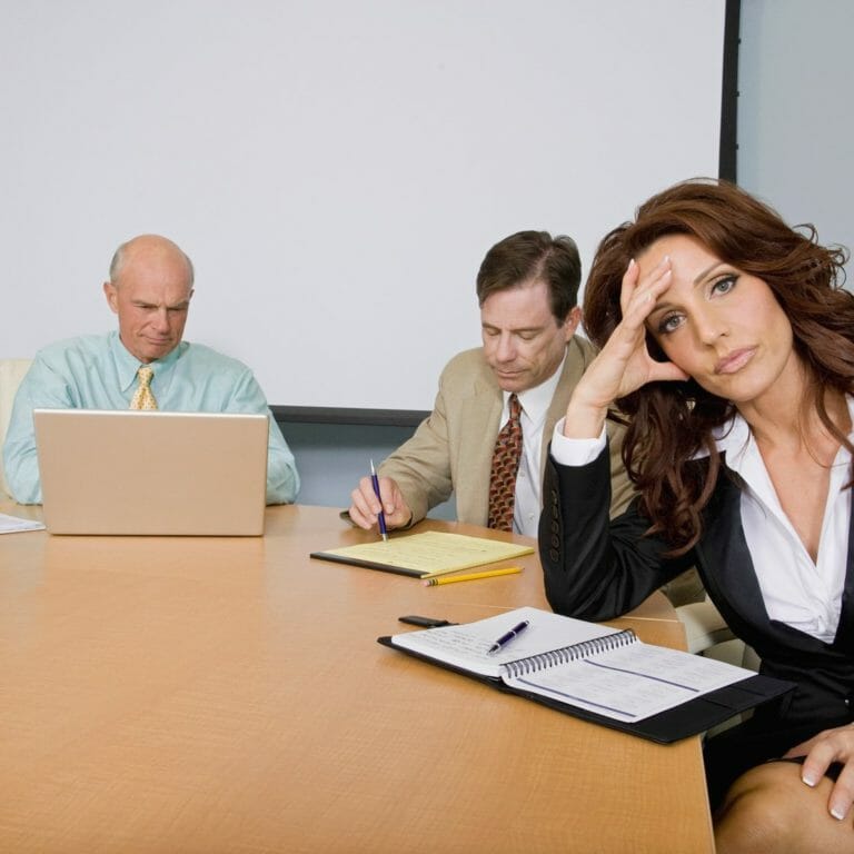 Woman bored in meeting