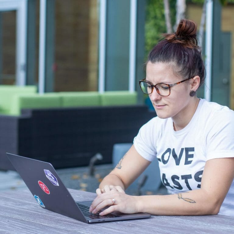 Shannon at computer outside