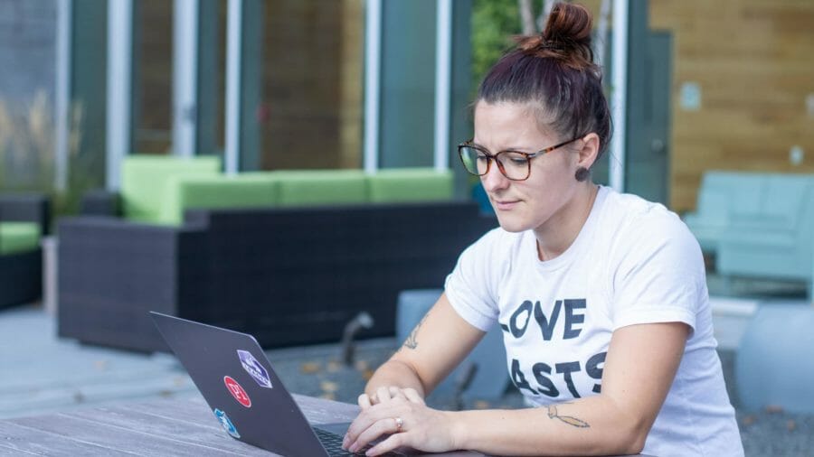 Shannon at computer outside