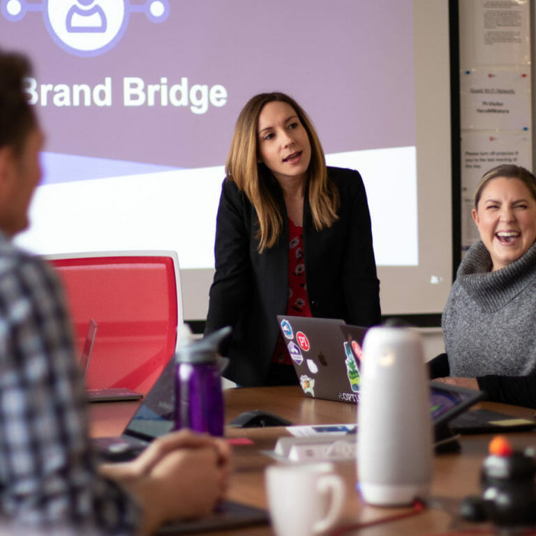 marketing team members aligning on strategy