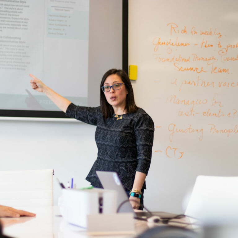 Manager speaking during meeting