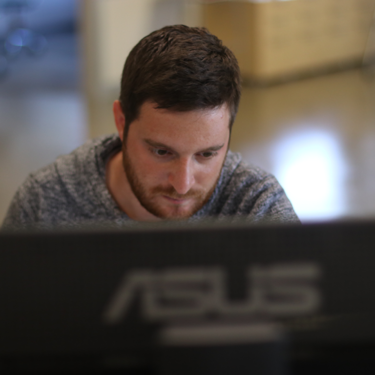 man working at his computer